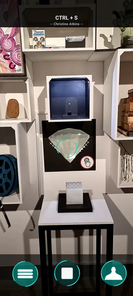 Artisan AR interface showing a triggered object layer.